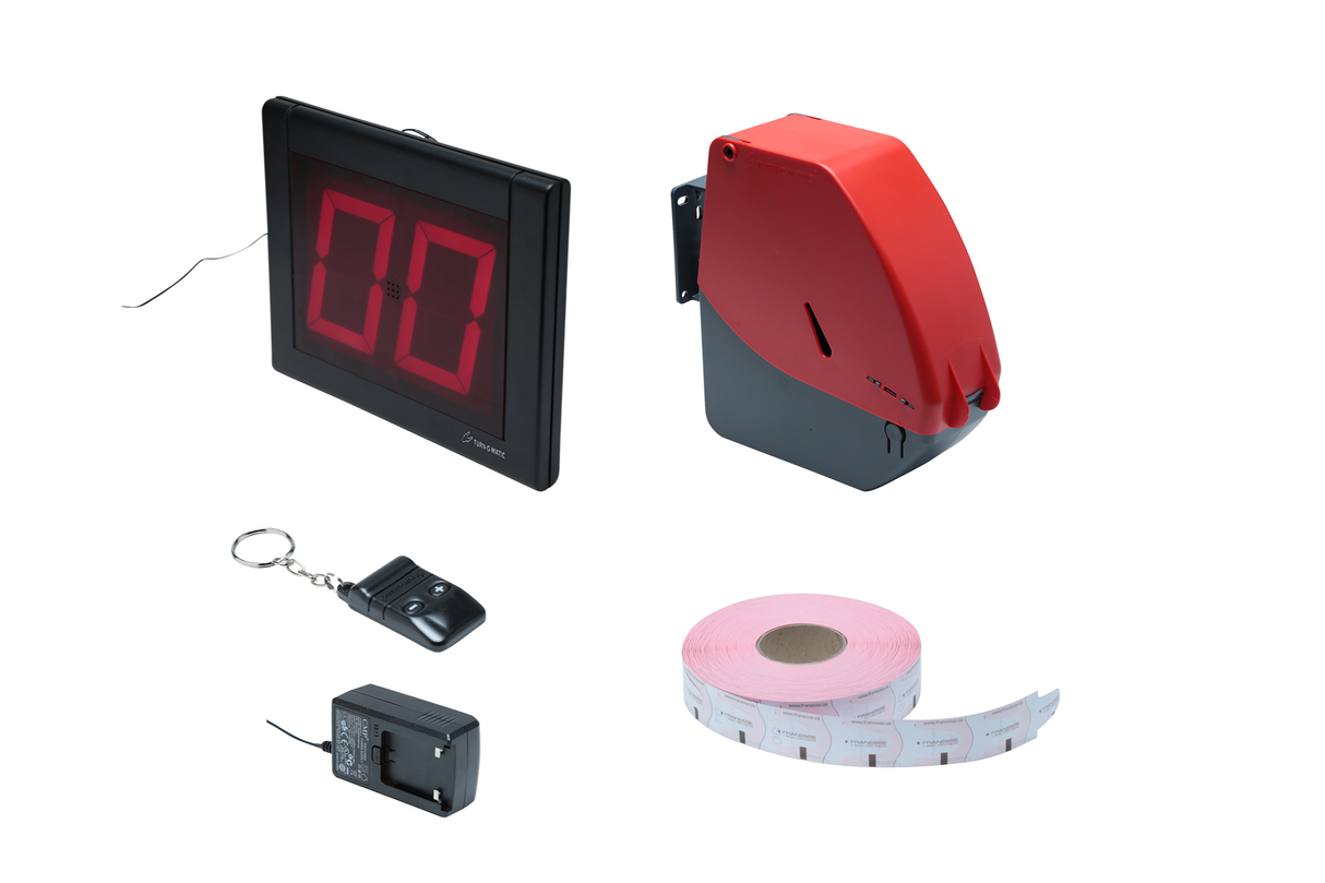 Système sans fil Turn-o-matic avec indicateur LED, distributeur de tickets, commandes sans fil, bloc d'alimentation et tickets.